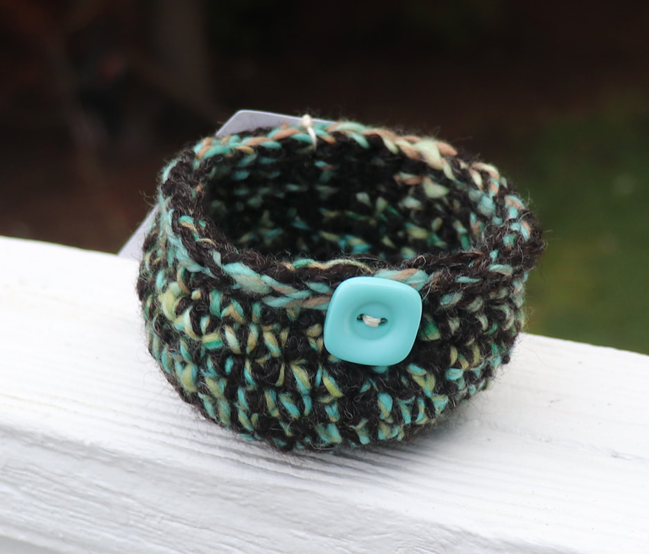 Treasure Bowl by Mary Jo Oxrieder - Crocheted bowl with hand spun wool yarn